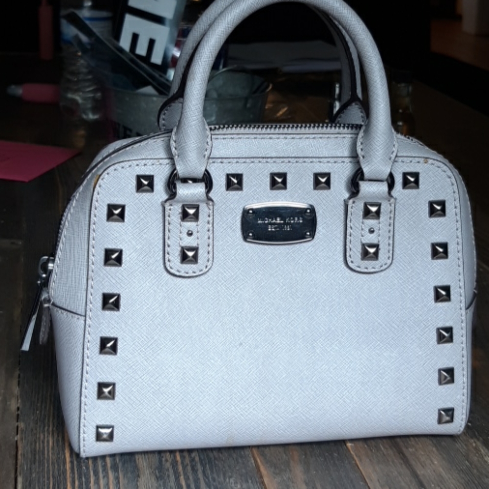 Grey studded Michael Kors mini cross body